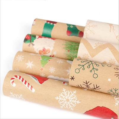 주문 80gsm 크리스마스 방식 선물용 포장 종이는 50cm*70cm 많은 새로운 디자인을 시트로 덮습니다 online manufacture